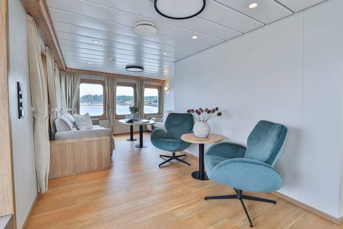 MV Vikingfjord Lounge Mid Stern View 2 Secret Atlas.jpg